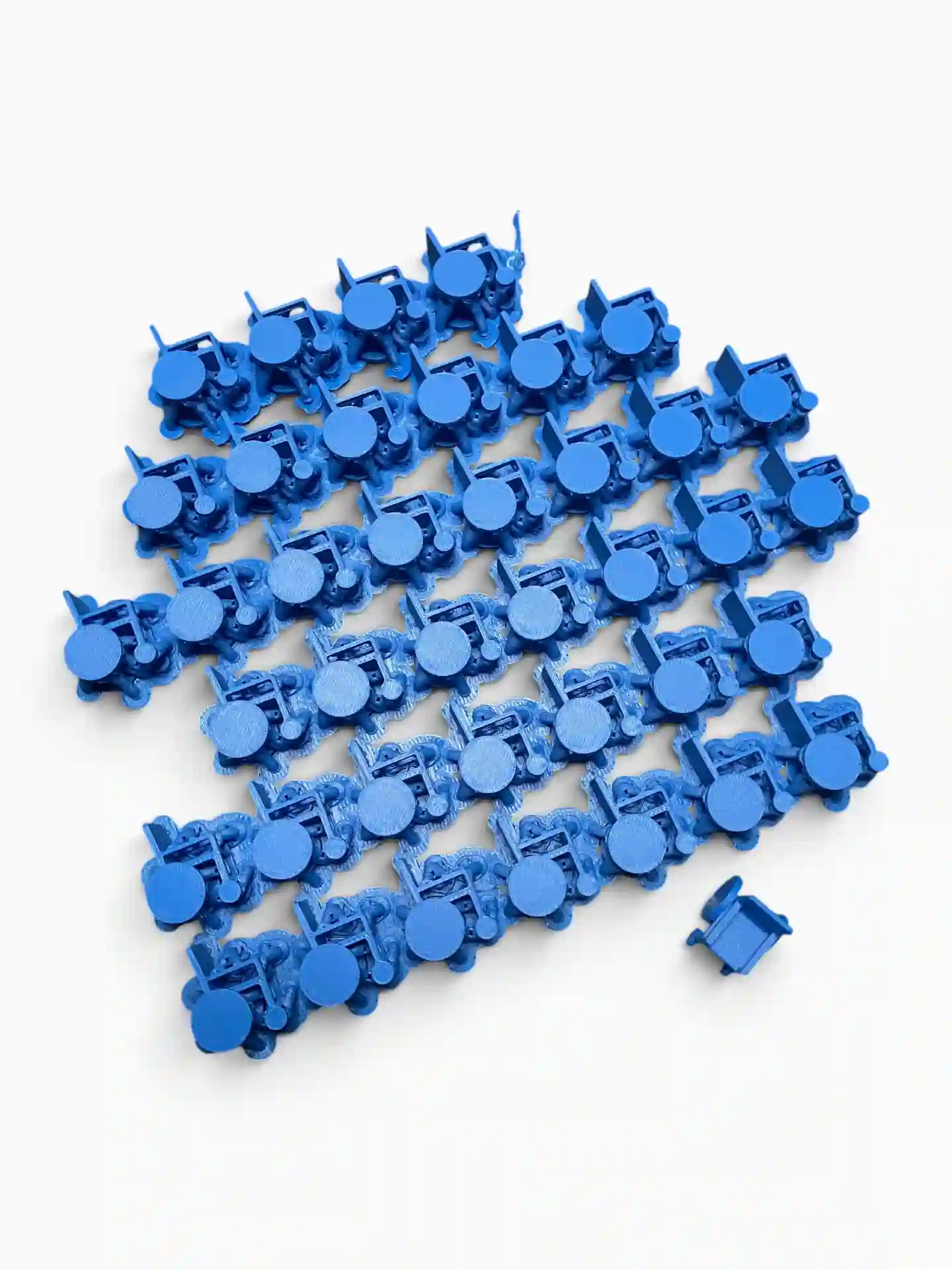 Petite série de pièces bleues fabriquées en impression 3D par ECU3D